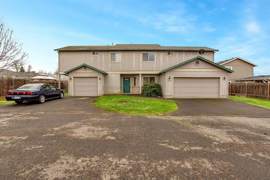 Fantastic investment opportunity with solid rental history in a great Medford location (Lone Pine Elementary). This duplex consists of one 3 bedroom/2.5 bathroom unit and one 2 bedroom/2 bathroom unit. Each unit has it's own garage, washer/dryer hook-ups and large, private backyard. The duplex is located on a large (.23 acre) flag lot, allowing for quiet and space. The larger unit was recently updated with new flooring and is currently unoccupied allowing for the opportunity for an owner occupy while gaining rental income from the other unit. The other unit has a solid rental history and financials are available for interested parties. Mirror image duplex is located across the parking lot and is available for purchase separately (MLS 3008616), creating even more income opportunity. Don't miss this opportunity in the growing city of Medford!