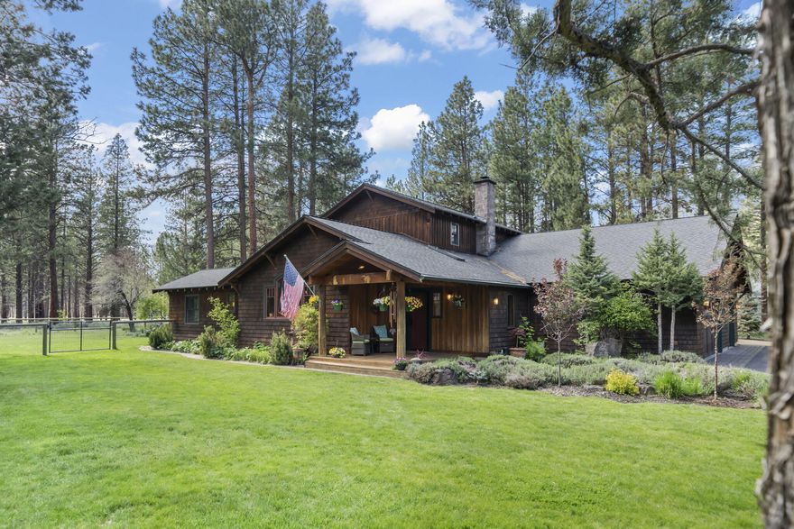 Sage Meadow peaceful and private retreat! Custom built 3-bedroom home with an additional office space, perfectly blends modern comfort with timeless craftsman details. The open floor plan features rich wood finishes, custom built-ins, and wide-plank hardwood floors.  The gourmet kitchen with vaulted ceiling, opens to the living area, with a large wall of windows that bathes the room in the natural light and nature of the exterior courtyard. The primary suite is on the main floor opening to the courtyard, with a large ensuite with dual sinks and tiled shower. Step outside to your private courtyard, a peaceful oasis perfect for relaxation and entertainment. The beautifully landscaped garden, with vibrant flowers and mature trees, backs to the National Forest with access to hiking and trails. Nature's beauty right at your doorstep. This home is a perfect blend of elegance, functionality, and outdoor living, minutes from downtown Sisters.