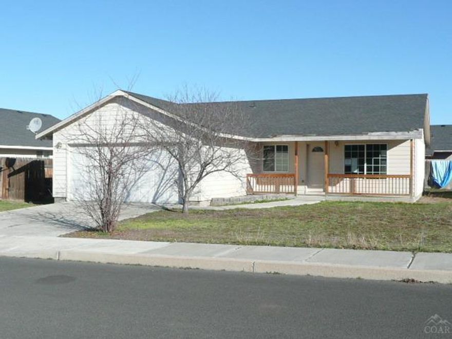 Price Reduced! HUD Home in Prineville. Open main living space with Pergo type laminate throughout living and dining rooms. Bathrooms and kitchen have tile flooring. Fenced yard and storage shed. Available beginning 7/31/14.