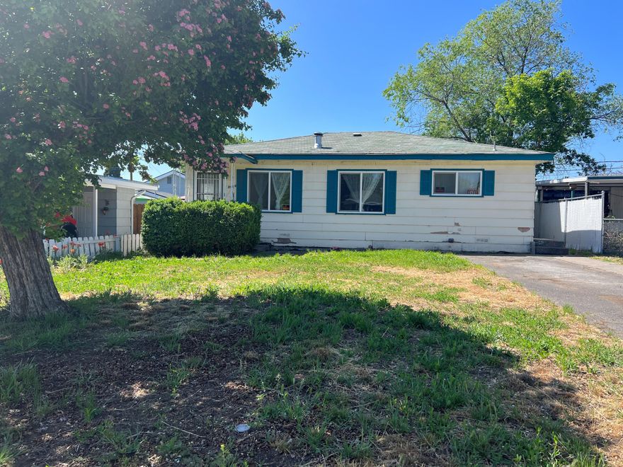 Wonderful layout in central Klamath Falls! This home features 2 nicely sized bedrooms, 1 bathroom and a comfortable layout. Large living room and kitchen with room for dining and eating areas plus a separate laundry room that could potentially be turned into an additional bedroom or office. Some laminate floors and new carpet in nearly the entire home. Tons of character and potential packed inside! Fully fenced yard and great front and back yards for room to relax, play and entertain. Large shed and workshop located in back with alley access for RV/boat/toy parking. Schedule your showing today!