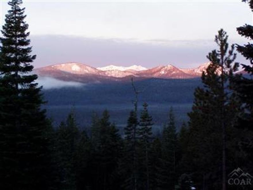 WOW - Lake & Mountain Views - backs to us forest land located at the top of Diamond Peaks in the cul de-sac. Easy access to all trails for 4 wheelers & snow mobilers. Parcel is in cul-de-sac on paved Roads that are plowed in the winter time. Drive way in and Parcel is site prepped & cleared, all Utilities are in the street & are underground. Septic Feasibility approved - Power & Water in street - hook-fee is $550.00. Owner may carry a contract - make offer motivated seller!
