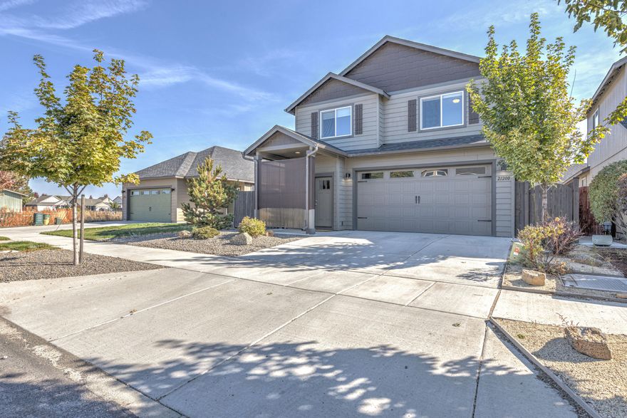 From the front door, you walk into Acacia engineered hardwood flooring on the main level paired with craftsman style trim.  Primary ensuite is on the main level.  White shaker style cabinets adorn the kitchen, solid surface granite, full height backsplash, and stainless GE cafe appliances. including gas range cooktop with electric oven and warming drawer.  From the back patio immaculately landscaped yard, along with natural gas BBQ as well as a large dog run that includes a storage shed. Second level provides quaint loft with Cascade Mountain and Pilot Butte views.  Fantastic location, Gardenside Park is a few blocks away, New brewery, small shopping center, and trails to keep active are within walking distance!
  Pride in Ownership inside and out!