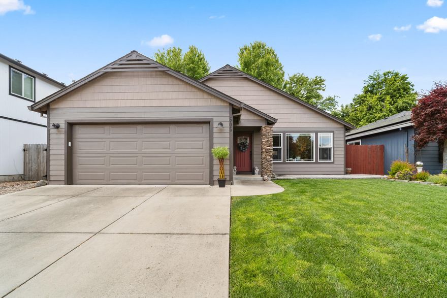 This beautifully maintained property features an updated kitchen with granite countertops, stainless steel appliances, and high ceilings for an open, airy feel. New LVP flooring and fresh paint throughout make it truly move-in ready. Stay comfortable year-round with a newer HVAC system and enjoy energy efficiency with a tankless water heater. Step outside to a tidy, landscaped backyard that backs up to the community park and has a peaceful patio- perfect for relaxing or entertaining. The paver front patio adds great curb appeal and a welcoming touch. Nestled in a convenient neighborhood close to shops, dining, and parks, this move-in ready gem blends style, comfort, and location seamlessly. Don't miss your chance to make it yours!