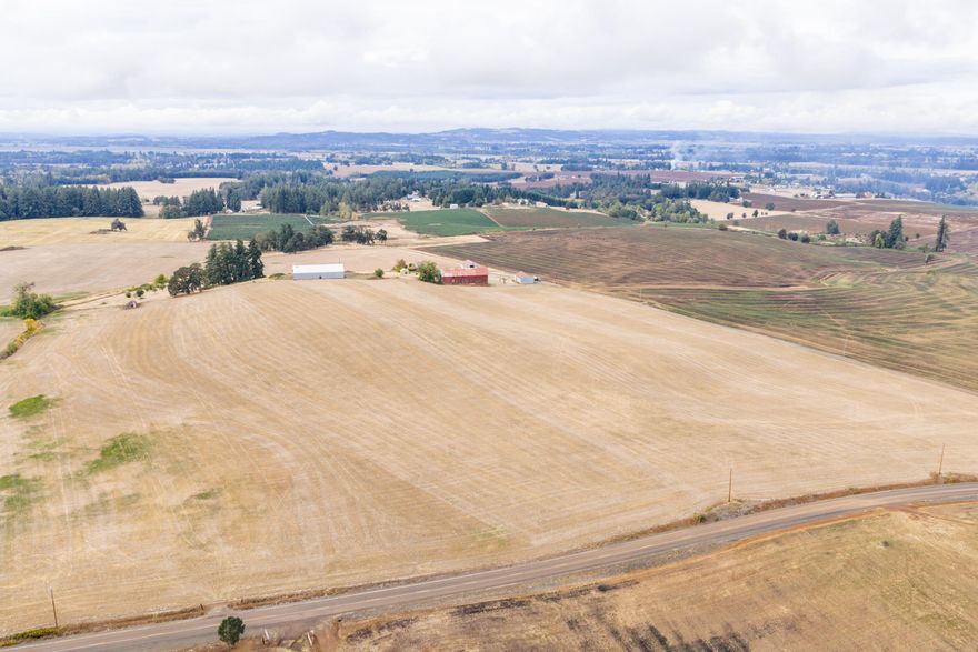 Established grass seed farm sitting minutes from Stayton, Oregon. Includes a very solid house with excellent views across the valley and good outbuildings. Versatile Jory and Nekia soils. Continue grass seed production or pivot to Christmas trees, cattle, sheep, or previously grown crops such as wheat, oats, clover, alfalfa, and hay. Evidence of extensive drain tiling throughout. This is a practical investment for operational flexibility.
