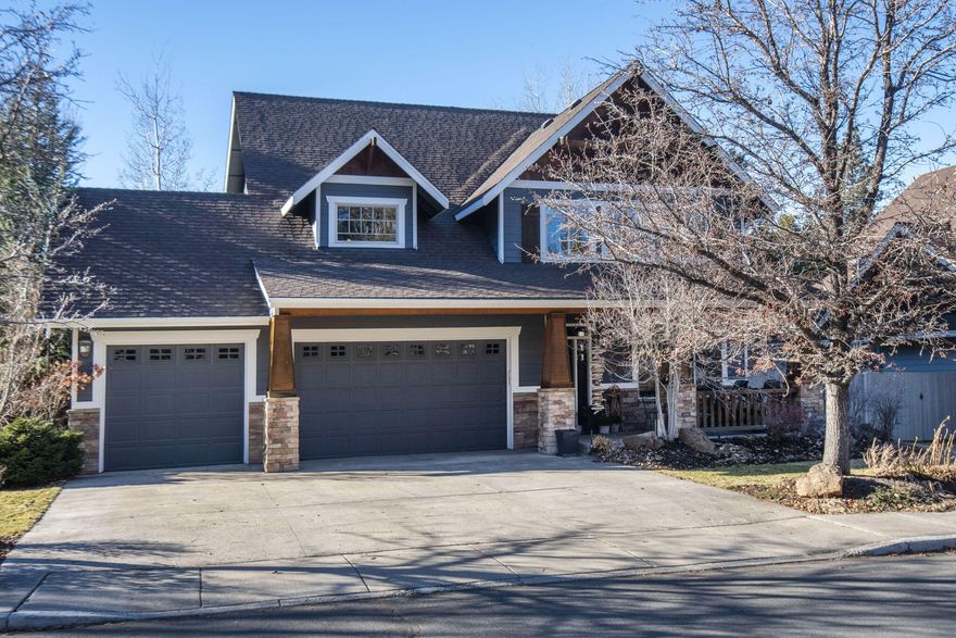 Step into this beautifully upgraded two-story home, boasting 3,000 square feet of elegant living space. Designed with modern comfort in mind, this home features an open-concept floor plan with soaring vaulted ceiling, a beautiful living room, dining room, office nook, bedroom/office and bathroom on the main level. The gourmet kitchen is a chef's dream, complete with quartz countertops, premium appliances, and ample cabinetry for storage. The warm hickory hardwood floors extend throughout the main living areas. Upstairs, the spacious primary suite offers a luxurious retreat, complete with a spa-like bathroom and his and her closets. Three additional bedrooms and a beautifully updated bathroom provide plenty of space for family or guests. Outside features a pergola, raised beds and fully fenced. The three-car garage offers generous storage, making organization effortless. Great SW neighborhood with parks and walking trails.