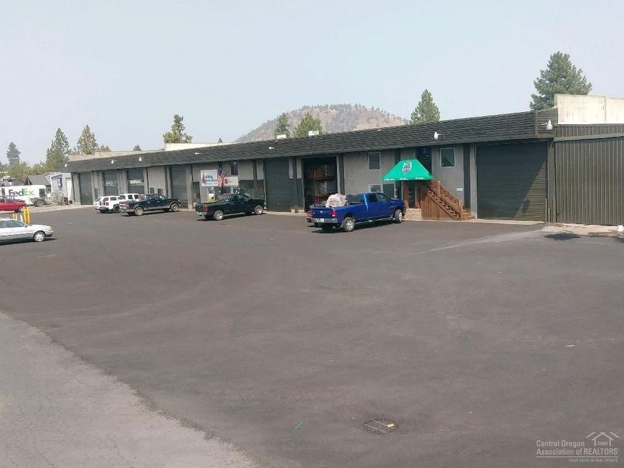 Attn Investors, huge price reduction! Property has potential tax benefits using the Opportunity Zone Program. Cap rate now 6%. Prime investment opportunity offered for the first time in the desirable fast growing Bend, OR! This property features newer solid long term leases, with a large majority being triple net. Great long term anchor tenant just signed a new 10 yr NNN lease, L&W Building supply backed by one of the largest construction supply corporations in the Country. Other features incl 4 buildings totaling 28,734sf, 5,090sf covered storage, 1,932sf 2nd level offices, 5+ ac prime Industrial land w/development potential, 7 tax lots, new paving, 6yr old roof, & some new HVAC systems.