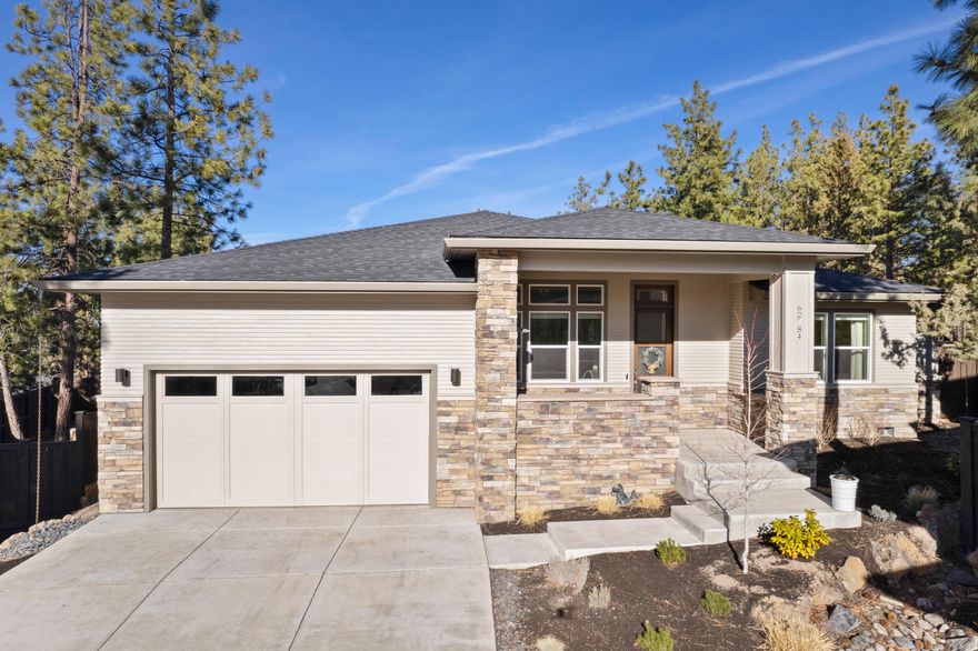 Nestled under a canopy of ponderosa pines, on an elevated .24-acre lot at the end of a private cul de sac, this home is the complete package! The quality is evident throughout this well considered 2,535 sf single level floor plan with 4 spacious bedrooms, 3 full bathrooms, 2 car attached garage & stunning forest & mountain views, just steps away from Shevlin Park & trails & close to downtown Bend. The great room features a stacked stone gas fireplace, hardwood flooring, vaulted ceilings, oversized picture windows, chef's kitchen with slab countertops & full backsplash, wine fridge & spacious island to gather around for happy hour. Added amenities include a dedicated office, master suite with walk in closet & soaking tub, junior suite, Cat5 wiring inside & out, covered paver patio, low maintenance landscaping with raised beds and sprinkler system, built in fire pit, fence and fully fenced gates on east and west side of home, & laundry/mud room with storage closets.