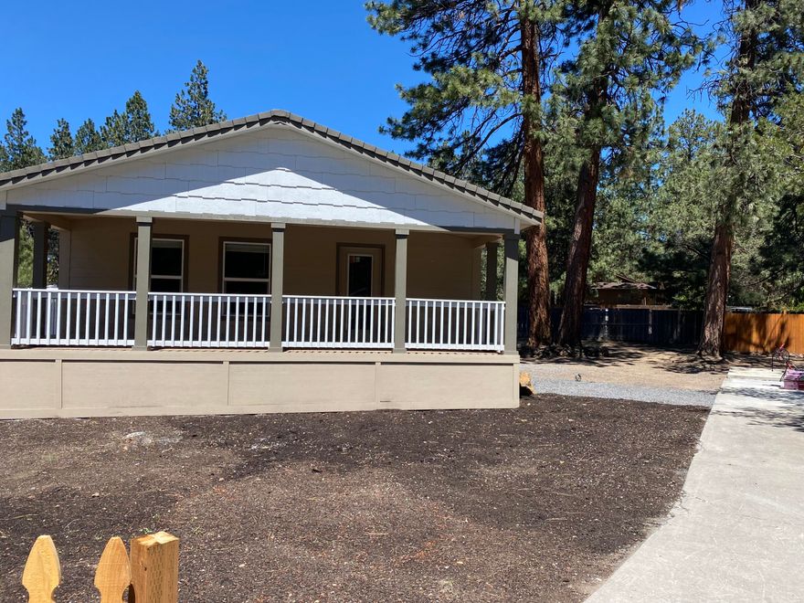 New home nestled in the trees on a large private lot in Romaine Village. This large home with an open floor plan is an entertainer's dream. In the summer enjoy one of the two decks, perfect for a BBQ. Have friends over for a movie night in the media room fully equipped with a refrigerator, sink, and plenty of counter space for snacks. Great separation between primary and spare bedrooms. The sale is on the home only. Land not included. Rent includes water, garbage,  use of the rec center and pool.