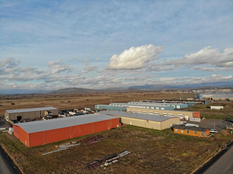 Amazing and very rare opportunity to own 56,362 Sqft of commercial buildings on 3.57 Acres! The possibilities are endless with General Industrial zoning including 3 buildings and a main office. Building A has 20,000 Sq Ft with 14-Foot Bay doors 3 phase power and fire sprinklers in place. Building B has 11,250 Sqft and 9 14' loading doors and 3 phase power. Building C has 23,546 Sqft 2 16'' loading doors and 3 phase power also including fire sprinklers. The very clean office has 1566 Sqft and has offices, kitchen, 1.5 baths, Tub/Shower combo and a bedroom. There are 5 power meters leaving the option to accommodate many renters for building B. Very large parking area and 2 entrances will accommodate easy access for any size vehicles and more than enough parking. Do not miss your opportunity to take advantage of this investment or business opportunity. Possible owner carry with 50% down.