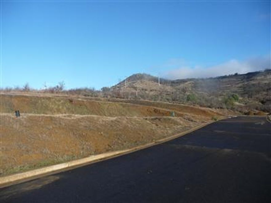 Incredible valley and mountain views of the Rogue Valley await you from the Ridge at the Highlands off Cherry Lane in East Medford. Part of a planned unit development with single family, attached garden homes and estate sized residential lots. This 1+ acre package includes the following garden lots of phase 1 of the Ridge at the Highlands: Lot# 16,17,18,19,20,21 & 22. 37+ acres of the previously tentatively platted phases 2-6 of the Ridge at the Highlands also available as a separate package. The entire Ridge at the Highlands bulk sale available for $2,030,000.