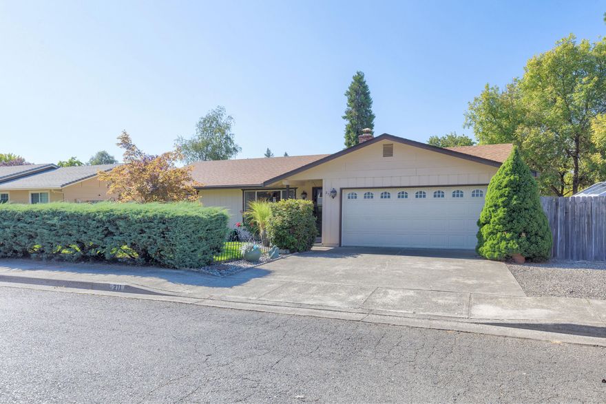 Nice Northwest Grants Pass Home!  Nestled in a cul-de-sac on .18 of an acre, this home was built in 1978 and features 3 bedrooms, 2 bathrooms, approx.. 1502 sqft., Livingroom with brick fireplace, Large kitchen w/lots of cabinets and counter space, breakfast bar, range/oven, dishwasher, microwave, disposal and double sink. Dining area w/sliding glass door to large family/sun room which has vaulted ceiling, fan and sliding glass door to back patio.  Primary bedroom w/carpet and bathroom w/shower. Other bedrooms also w/carpet and main bathroom with tub/shower. Laundry is in the 2-car attached garage. New 30-year roof in 2022, new heat pump in 2020.  Fenced backyard with large gate on side of garage for RV, Boat parking. Close to town, schools, shopping, hospital, full service gym & spa and public park!