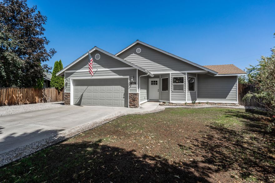 There is nothing not to love about this amazing home. Come be welcomed by the vaulted ceilings, recent upgrades, and HUGE yard! Enjoy many fruit trees such as pie cherries, crab apple, apricot, pear, and peach along with tons of space for anything you can imagine.