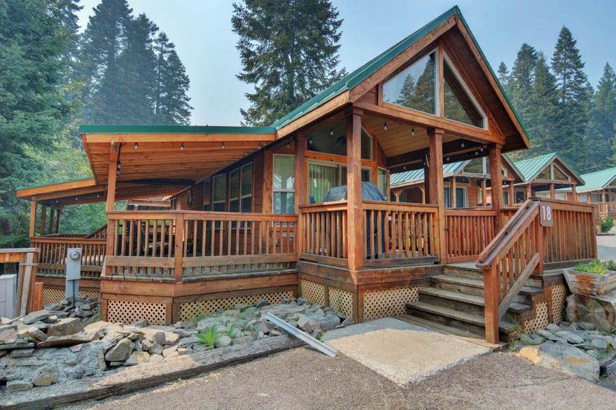 Completely furnished Hyatt Lake Camper's Cove cabin in the beautiful Cascade Mountains! An all season paradise of fishing, boating, snow sports, trails and hiking. Your front porch greets you and a secluded hot-tub is on the large L-shaped deck, with your own creek along side. There's an additional, fully enclosed mud room added on to the back and tall covered storage for snowmobiles and ATV's. The home is fully furnished, ready to go. Sleeps six, queen bed down, queen bed and sitting area upstairs and sofa sleeper. All appliances, furniture and furnishings are included. Hot tub is six months old, iFit.com Treadmill included, yard is fenced for pets, LED patio lights and new-last-year BBQ included! Table Mountain Snow Park is less than two miles away!