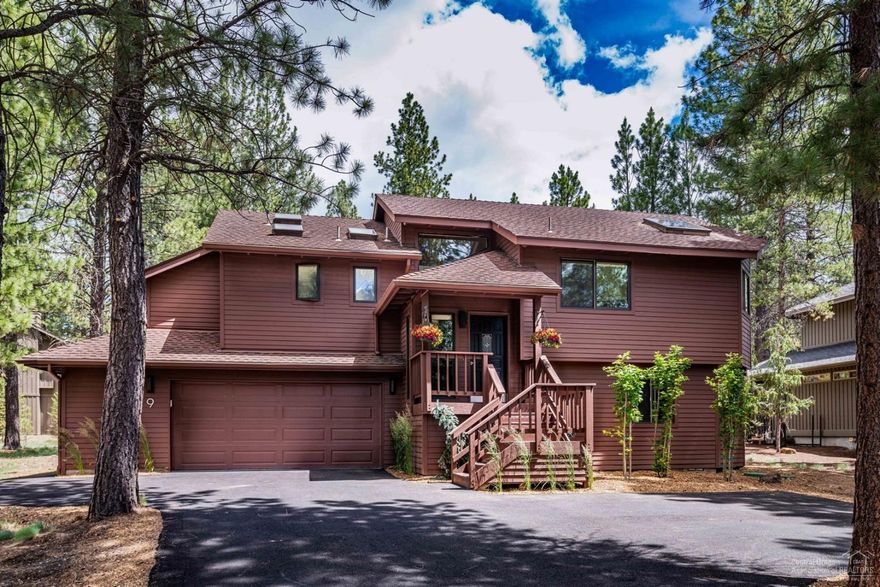 Wonderful setting, at the end of a cul de sac, with trails leading from the back door to the National Forest, yet close to the Woodlands Golf Course and the amenities of both Sunriver and Bend. Cozy and comfortable home with the great room and master on the upper level, and 2 bedrooms and bath down. The open great room/kitchen has vaulted ceilings, lots of windows & a skylight. Brand new wood floors in the great room and on the stairs, and new light fixtures and ceiling fan. The kitchen is recently remodeled with a new gas stove, new refrigerator, new solid granite countertops and refinished cabinets including pull out pantry storage. Access to the private deck which extends across the rear of the home. New barbecue by the kitchen, new hot tub by the master bedroom. New carpet in bedrooms. Dry outdoor storage is perfect for kayaks & bikes. Attached 2 car garage with additional work area and storage. Pride of ownership shows. This home is the perfect retreat or a great vacation rental.