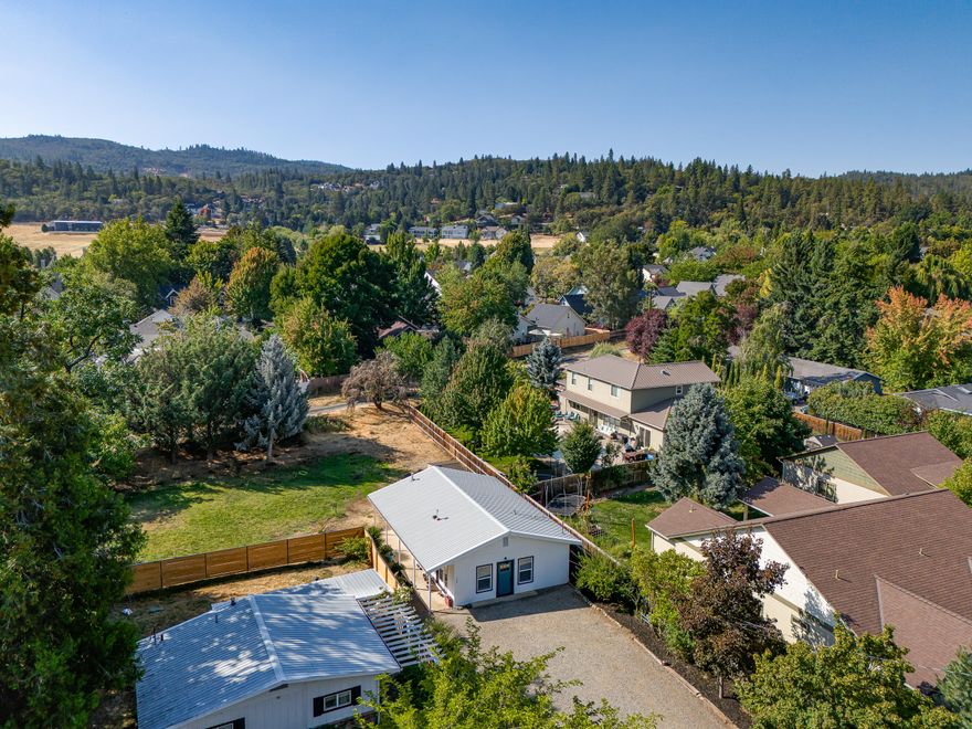 Tucked away on a spacious .29-acre lot, this beautifully remodeled cottage in Jacksonville is a true find. Recently updated in 2022 with further enhancements in 2024, it blends modern features with classic appeal. The large kitchen is a standout, with stylish white cabinetry, stunning quartz countertops, and premium stainless steel appliances, including a gas cooktop and double ovens. The
bathroom is a true retreat, offering a new double vanity, a beautifully tiled shower, heated floors, and a heated towel bar. Step outside to a generous backyard, featuring a new privacy fence, a fresh shed, and direct access to the City path. Plus, there's potential for an ADU* in this flexible space.   Don't miss the chance to own this exceptional property! 

Sellers are offering a $10,000 credit to buyer to use towards closing costs, upgrades and/or repairs.

*Buyer to do own due diligence with City of Jacksonville