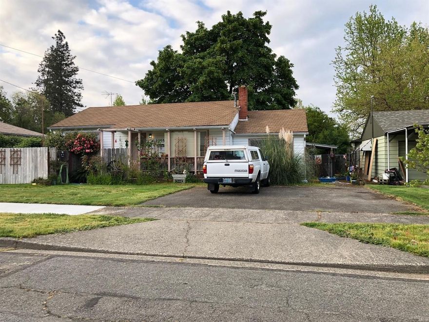Cute 2BR/1BA cottage! Hardwood floors and a lot of character throughout. Plenty of back yard for garden space and critters. Check it out!