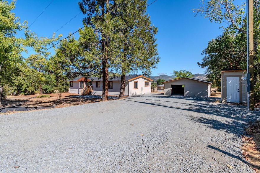 Exceptional 4-bedroom, 2-baths home nestled on nearly an acre with convenient access to Central Point and the Rogue River. This split floor plan features a spacious laundry room with washer and dryer. While the master suite boasts a luxurious soaking tub, walk-in shower, dual vanity, and unlimited hot water from a tankless propane system. Enter the home to a large open kitchen with new can lights, raised island for additional seating, granite counter tops and vaulted ceilings, complemented by a certified wood-burning stove perfect for cozy winter evenings while enjoying sunsets over the Table Rock mountains. Two additional bedrooms & 4th bedroom/office, offer great closet space and a second bathroom with a tile walk-in shower. Recent updates include a shop with new siding, roof, and electrical panel, plus new well pump with power, new septic tank, and complete electrical service upgrade. Everything has been addressed to the seller's knowledge. Which happens to be the listing Broker.