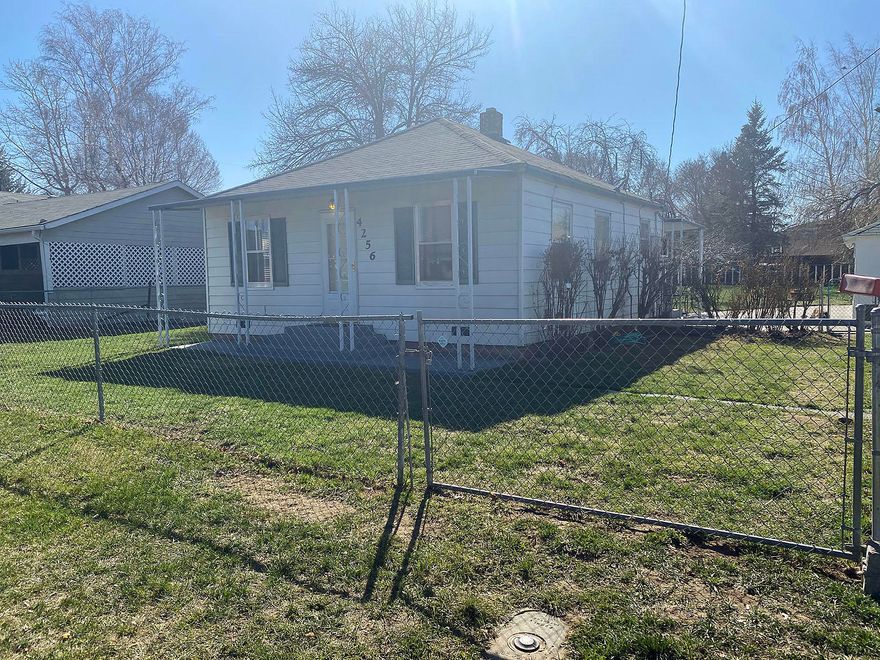 This adorable home sits on little over a third of an acre with a fully fenced yard and a nice sized garage. Let this cozy house welcome you home upon entering the front door with new flooring and paint, built-ins in each closet, an updated bathroom and a spacious kitchen with room for an eating area. Enjoy the large backyard with plenty of room to run! Don't miss this property!