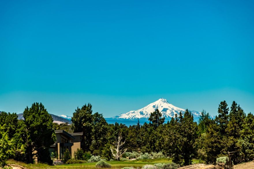 New Exceptional Price! For this fabulous Homesite on Tom Fazio's 12th Hole! Seize the opportunity to build your dream home on one of the most spectacular homesites in Pronghorn. Spanning .95 acres, this premier west-facing lot offers breathtaking views of the Cascade Mountains & pristine fairways, creating an unrivaled backdrop for luxury living. Enjoy year-round golf on 2 Championship Courses—the Fazio and Nicklaus—while indulging in the world-class amenities of Juniper Preserve Resort: a Private Member's Club, Dining, Village Market, Pools, Day Spa & Fitness Center, Dog Park, Pickleball Courts, Hotel on site, Wellness Center, Scenic Bike Paths, Nature Trails, 24HR Staffed & Gated entrance, & more. All just a short drive into Bend and the Redmond Airport, making this an ideal retreat with convenience at your doorstep! Complete Survey & Geological topo map. Pronghorn Club Membership Included!