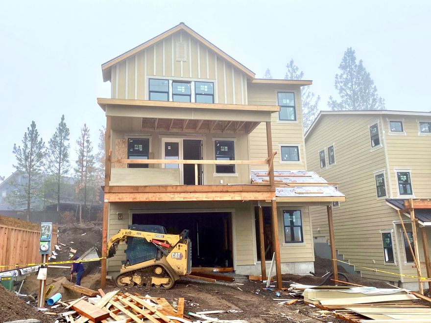 Situated on Bend's West side, Lot 16 in the new Marken Summit neighborhood is located near shopping, schools and restaurants. This Northwest Modern style home features a creative selection of finishes and an efficient floor plan fit for any buyer. Enjoy the impressive top floor primary suite featuring large walk in closet, tiled shower, and double vanities. Also on the top floor you will find two other bedrooms and another full bathroom as well as a generous loft space. The kitchen features custom cabinets, slab quartz countertops, and stainless steel appliances. 2 car garage. Earth Advantage Certified and built by Stone Bridge Homes NW LLC.