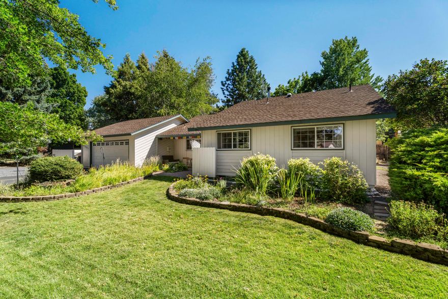 Step into this groovy '77 Ranch Home with 3 bedrooms, 2 baths and 1,464 SF on nearly half an acre of lush landscaped beauty. Retro character meets modern potential, ready for your personal touch. Picture mornings in the greenhouse turned art studio, afternoons in the garden beds, and peaceful evenings under mature trees. Irrigation rights keep everything thriving. There is space for your RV with full hookups and room that may allow an ADU (buyer to verify). Close to town, trails, Larkspur Park and the Community Center. Less than a mile to Reed Crossing Market: Bagels & Coffee, Greek food, Tacos, Cascade Lakes Pub! This home is a canvas for creativity and a lifestyle that feels both timeless and fresh. Gardenia Avenue invites you to make it your own soulful retreat.