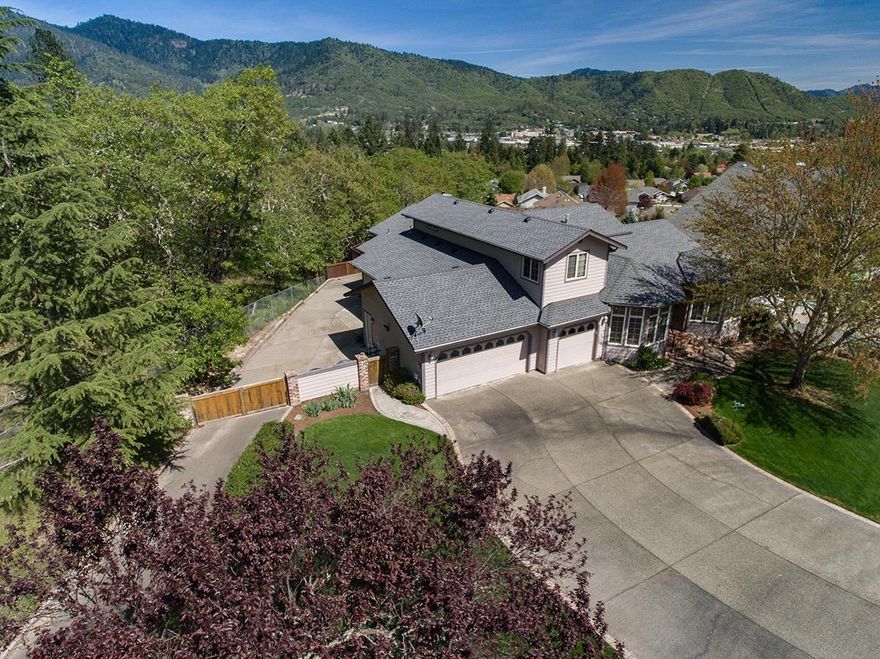 Enjoy Spectacular Mountain, City & Valley Views from this Custom Home in Desirable Cooke Estates! Built in 1997 this Home has been Lovingly Maintained and offers 3 Bedrooms, 2 Baths on a .30 Acre Lot. Spacious Main Level Master Suite boasts Gorgeous Tile Shower, new Flooring in Bed/Bathroom, Jetted Tub & Walk in Closet. Kitchen has new Flooring, Tile Counters, Stainless Gas Range & Fridge. Office & Living Room offer Expansive Windows and make Wonderful Spaces to Work or Relax. Large Bonus Room with French doors is set up as a Media/Entertainment Room. Home has Vaulted Ceiling and Beautiful Hardwood Floors in Entry, Dining Room & Hallways. Covered Deck off Family Room is a Fantastic Place to Gather and Entertain with a couple of Sitting Areas, as well as a Hot Tub. Three Car Garage with Lots of Storage, Paved RV Parking & End of Cul de Sac Privacy are other Features you will Appreciate. These Quality NW Homes don't come on the Market often--make your Appointment to View Today!