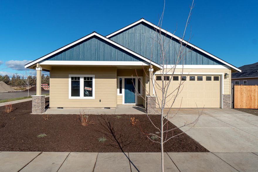 Looking for that perfect home on a big lot w/ views but near stores too? Completed this Fall by Dunlap Fine Homes on the Bend side of Redmond w/Cascade Mtn Views. Spacious living both inside & out, w/plenty of room for entertaining. Vaulted Great Room plan w/open Kitchen, tons of cabinetry & prep space on the slab Quartz counters. Neat & tidy full height tiled back splash, SS appliances & farm sink. Living space offers a cozy corner Gas burning fireplace w/stylish accents & room for gathering. Desirable Master separation, walk in closet, step in shower, tiled floors & dual vanities. 2 additional guest rooms off the entry w/full bath. Laundry room w/storage & folding table too! Durable wood look laminate flooring, carpet in the bedrooms & tiled baths. Gas forced air, A/C & back patio. Double garage, gated RV parking, fully fenced, fully landscaped w/auto sprinklers. Space for a shop or Casita ask for plans! Photos of similar plan. Don't miss! OPEN HOUSE JOB SHACK AT LOCATION!!