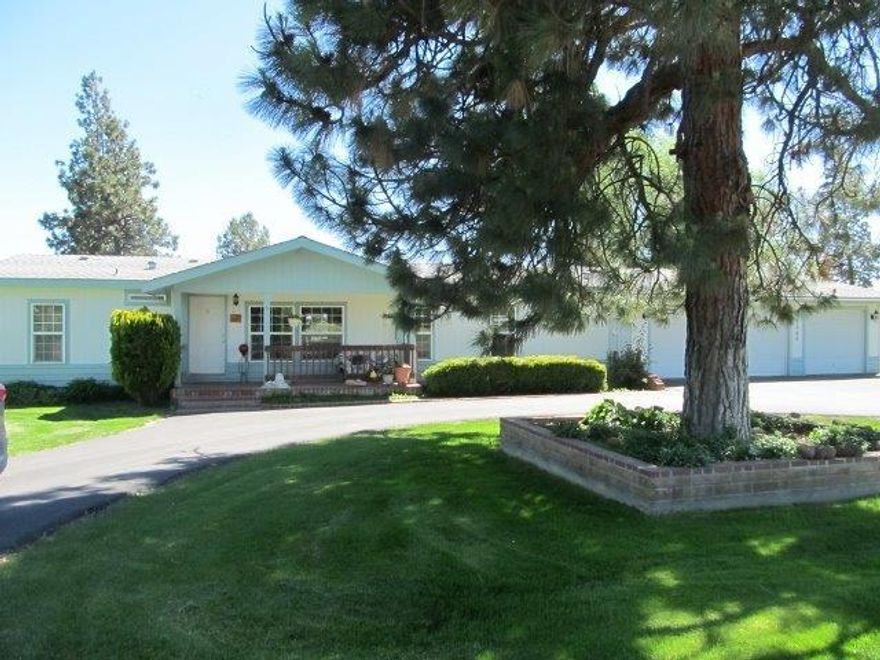 This home is charming and very comfortable with a 3 car garage and paved driveway. Trees dot the yard with shade and green grass. all fenced. The home is 3 bedroom 2 bath and a den or extra bedroom. Has a formal dining and a kitchen breakfast nook even a covered patio. Very well cared for yard and all surroundings. This is a definate must see.