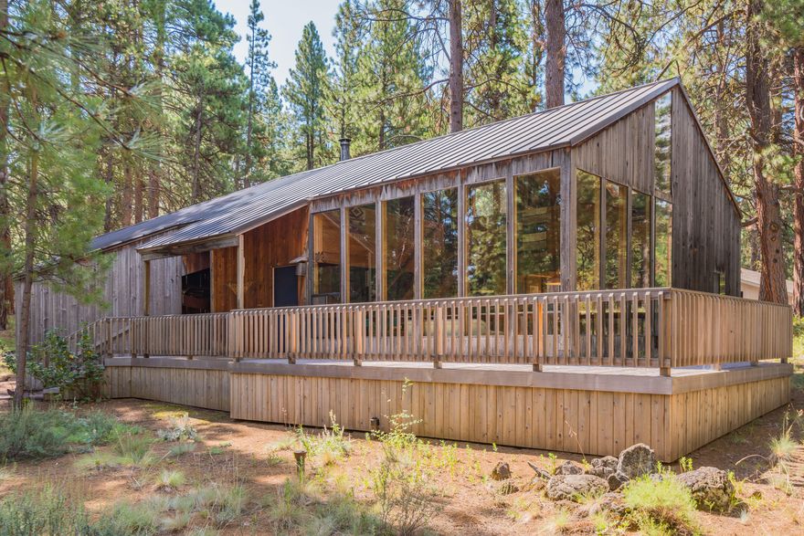 One of Black Butte Ranch's most iconic and rustic cabins. Located in the desirable East Meadow area of the Ranch, this cabin gives the owner easy access to the lodge and Lakeside recreational activities. Built in 1972, the rustic open floor plan home is light and bright. With high vaulted ceilings and open air access to the two lofted rooms, family and guest are always together. The cozy living room has a fireplace and warm spaces to curl up with your favorite beverages and books. Home sits on a large one acre lot adjoining National Forest on the SE border of property. This unique home is featured in SchoolHouse Electric & Supply Co. Catalog.