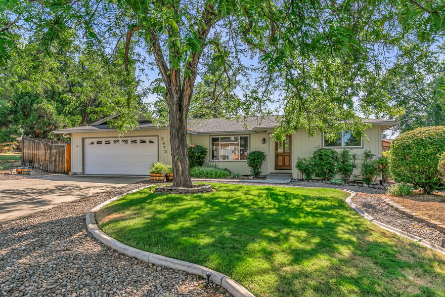 Charming East Medford Gem on a Quiet Cul-de-sac Welcome to this beautifully maintained, one-owner home nestled in a serene East Medford neighborhood. Boasting over 1750 square feet, this 3-bedroom, 2-bath residence features a desirable open-concept floor plan perfect for comfortable living and entertaining. The updated kitchen shines with granite countertops, stainless steel appliances, and ample cabinetry. A cozy family room with a gas fireplace and expansive windows fills the home with natural light, while a separate living room adds extra space to relax or host guests. The spacious primary suite includes direct access to the backyard patio, a walk-in closet, and a tastefully remodeled bathroom complete with dual sinks and a walk-in shower. Step outside to your private backyard oasis fully fenced and framed by mature landscaping with an inground pool, generous patio space, and room to unwind or entertain. Don't miss your opportunity to own this inviting home in East Medford.