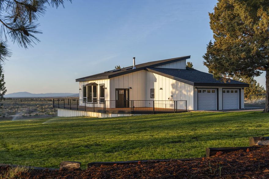 Brand New Septic Tank!  Explore this renovated residence, ideally situated in a private setting just 10 minutes from town. Enjoy stunning views of the Cascade Mountains, Smith Rock, and adjacent BLM rangeland, with direct access to public lands from the neighborhood for outdoor recreation. The exterior features updated landscaping, a new roof, windows, French door, siding, and expansive decking. Inside, the home offers newly designed bathrooms, premium flooring, refined trim, fresh paint, and a modern kitchen equipped for culinary excellence. Tailored for RV owners, the property includes dedicated parking with 30 amp power and sewer hookup. Move-in ready and thoughtfully crafted, this home combines contemporary elegance with Central Oregon's natural splendor. Schedule a viewing to experience this exceptional property.