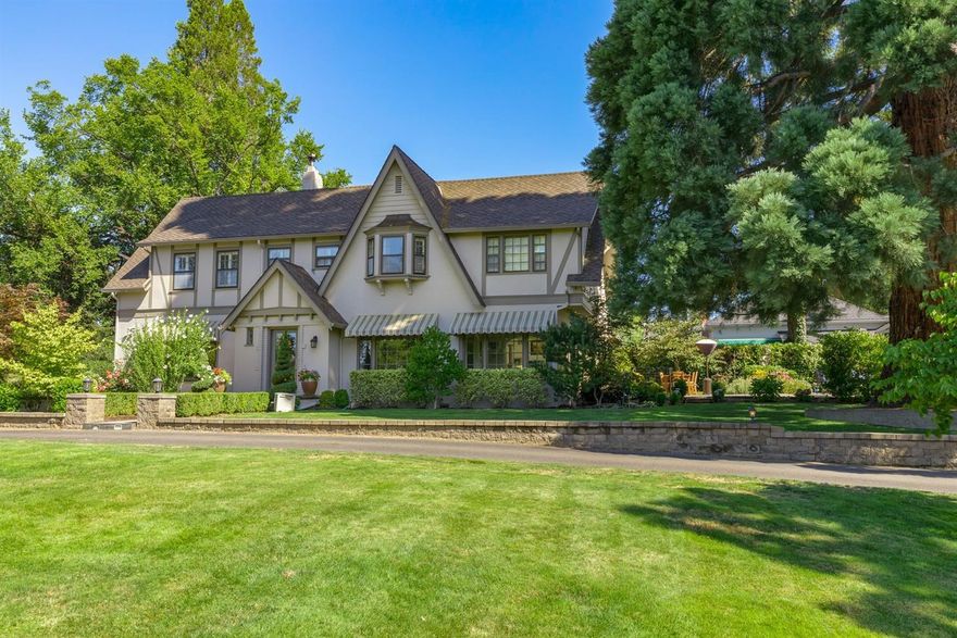 Grand 1922 Frank Clark designed home located on Premiere private, all fenced & security-gated, lush.81 acre grounds 1 block from RV Country Club. The spacious open plan w/ light-filled rooms fit for entertaining or special family gatherings has been professionally updated by previous & current owners and includes 3 new baths, an amazing vaulted great rm, kitchen, nook & sunroom; formal living & dining, office/den, & lg bedroom w/full ba for 1st floor master or guest suite. Elegant center hall staircase (like Gone w/the Wind) has new hdwd steps, etc. and leads to upstrs master, ensuite & dressing rm, and 3 additional bedrms w/full bath. This masterpiece also showcases a custom wine cellar, newer laundry rm, loads of special cabinetry, moldings, marble, gorgeous wood floors & ambiance you will never want to leave. Park like grounds w/professionally lit Redwood tree by patios, I/G Pool w/H20 slide, hot springs spa, trampoline, storage shed,endless area for playing sports/games-AMAZING!