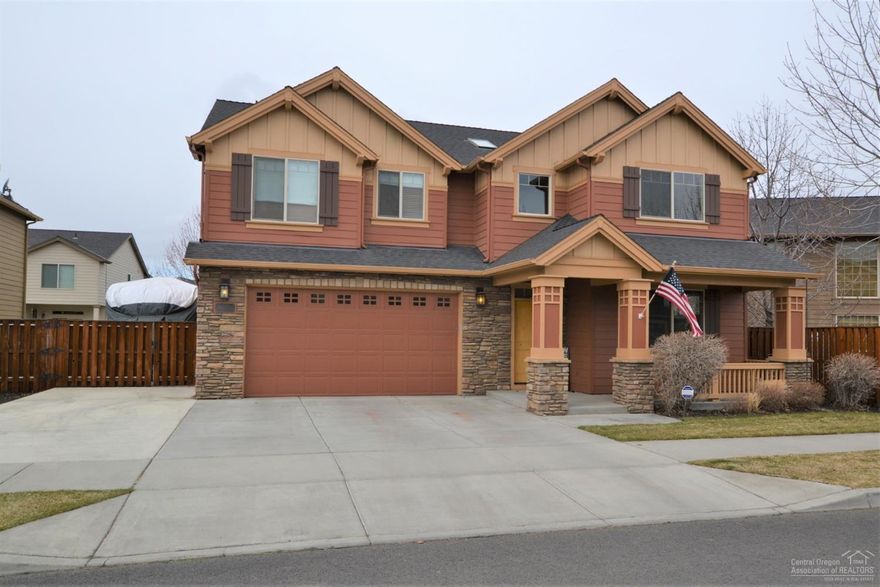 Located in NW Redmond, the Ashton floor plan is the largest in the community with 2,870 +/- sq ft, 4 beds, 2.5 baths, huge bonus room, office/work room and much more! Ideal for entertaining, featuring both formal and informal dining rooms, open kitchen with counter bar and butlers pantry. The living room boast custom built-ins, gas fireplace and stone surround. Upstairs there are 3 spacious guest rooms. Laundry room with folding table. Bonus room with vaulted ceiling and guest bath with double vanity. The master suite is incredible and includes a large master bath with soaking tub, separate shower and enclosed toilet. Walk-in closet and an office/workout room! Other features include natural gas forced air plus AC, water filtration system, central vac, 3 car tandem garage with workbench and sink, gated RV parking that will fit a 25 + ft RV, fenced yard with patio and more! Enjoy your summers at the community pool while the HOA maintains your front yard. This is it!