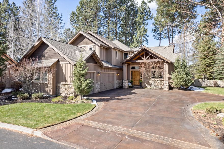 Set among towering pines and nestled just off the Deschutes River in SW Bend, this custom, Schumacher Construction-built home sits within the gated section of River Rim and provides abundant privacy on over 1/3 of an acre. The residence offers 3 bedrooms, 2-1/2 bathrooms, and a dedicated office, all centered around a great room in the heart of the home. Chiseled granite countertops in the kitchen, a temperature-controlled wine storage room, extensive use of alder cabinetry and finish work, hickory floors throughout the main level, a large outdoor covered living space, and outdoor kitchen are just some of the features of Charleswood Lane. The upstairs primary bedroom suite features two walk-in closets, a gas fireplace, and peek-a-boo Mt. Bachelor views. Close proximity to the river trail, Old Mill District, shopping, dining, and the tranquility of the Deschutes round out this offering in one of Bend's most coveted communities.