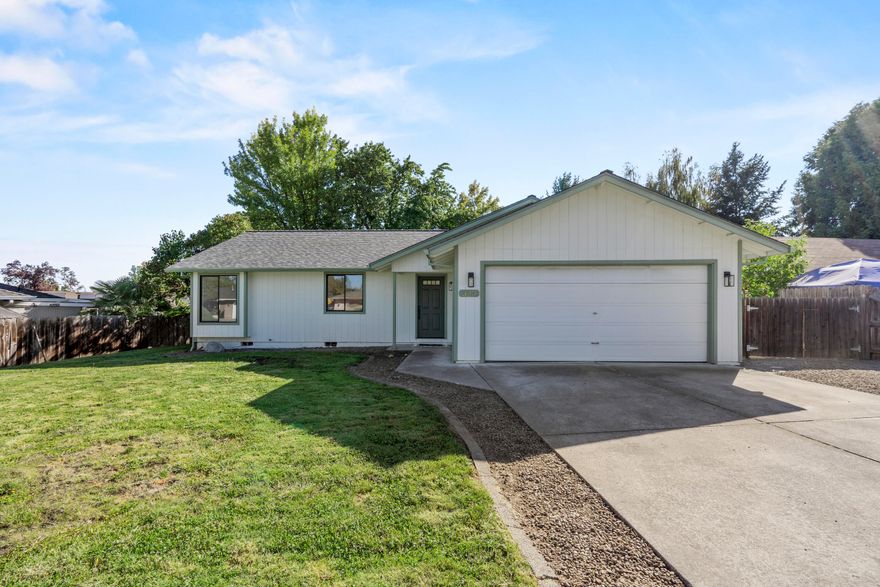 This home is a meticulously updated 3 bedroom, 2 bathroom cutie in Central Point with a giant backyard and RV parking. You'll love the gorgeous tiled showers, white quartz counters, brand new stainless steel appliances, homey luxury vinyl plank flooring, modern new lighting, and fresh interior paint - all with a newer roof and finished garage. Make your appointment to see it today! Seller agent has an ownership interest in the LLC that owns the property.