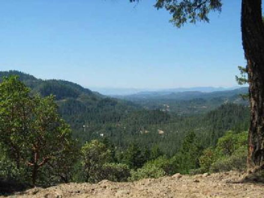 This 40 acre parcel is approximately 1 mile off Hwy 62, 2 miles past Trail. The non-expiring homesite provides 360 degree views, including southerly down valley to the Rogue River, Table Rocks and Jacksonville. The property also has an additional flat view site that would be great for a shop or whatever. Property backs BLM! Lots of wildlife. Whether you're seeking an exclusive homesite or cabin site, you need to check this one out!