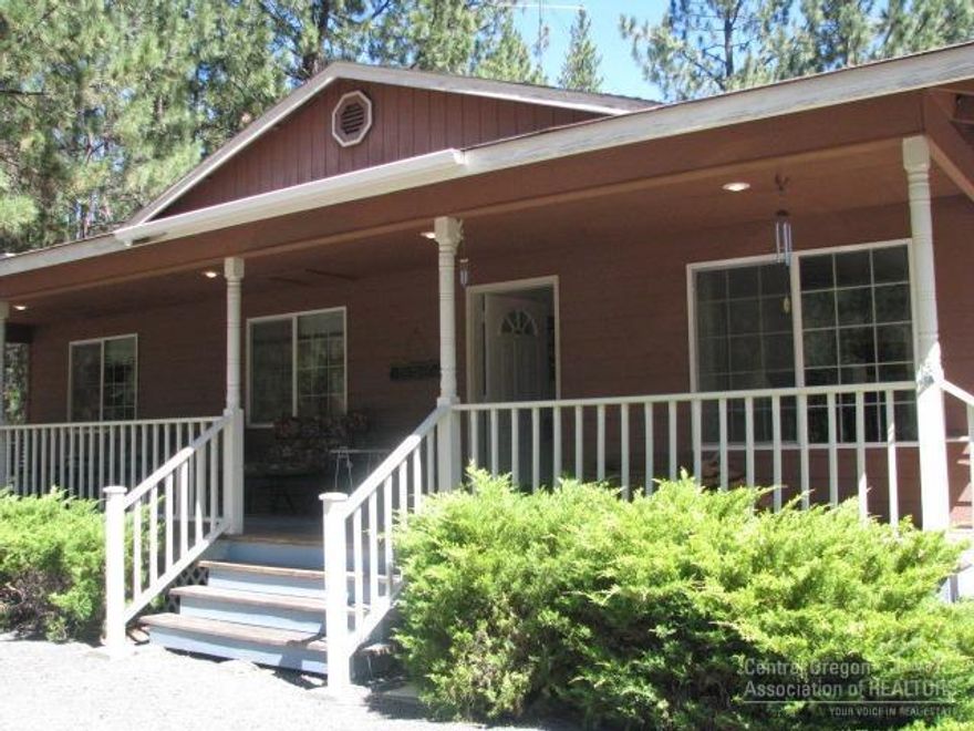 Welcome home! Enjoy the quiet peaceful setting, watch the deer and wildlife from your large front porch and back deck. This stick built home features an insulated 3 car garage/ shop. Above shop is comfy guest quarters including kitchenette and full bathroom. Close to medical facility, shopping, lakes and rivers. 2nd full bath is located in guest suite above shop. Pristine and move in ready!!