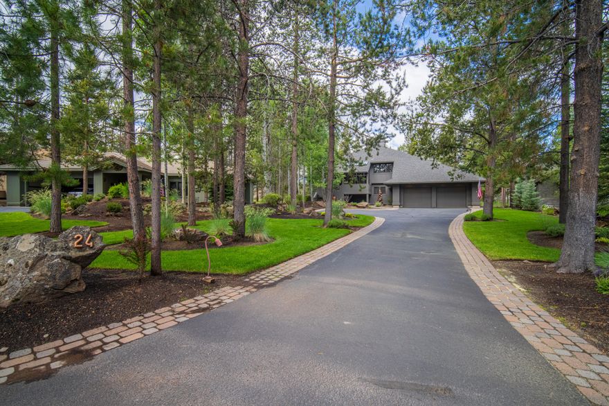 Discover unparalleled luxury and privacy at 24 Cottonwood Lane, a designer home with view of the golf course frontage in one of Sunriver's most coveted neighborhoods. Nestled on a serene cul-de-sac in the north end of Sunriver, this residence boasts a classic Great Room design with a stunning floor-to-ceiling fireplace. Enjoy outdoor living on two spacious decks, and a secluded deck off the Primary Suite. The home features a centrally located bonus/media room, perfect for relaxation or entertainment. Additionally, there is a second suite and two more generously sized bedrooms, offering ample space for family and guests. This exquisite property blends comfort, elegance, and the tranquility of golf course living. Don't miss the opportunity to own this exceptional Sunriver retreat.