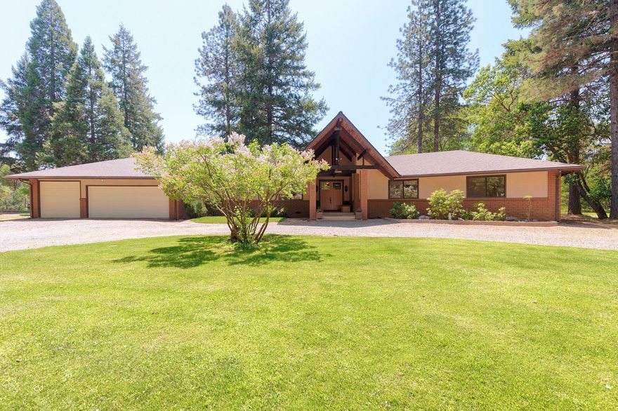 New Price! Sale fell by no fault of property! Exceptional country paradise - tastefully renovated, 3230 sq ft + home on 7.28 acres! The floor plan flows nicely from the grand entrance throughout - Vaulted ceilings in the living room. Russian oak floors in the living room, kitchen and dining areas. HVAC plus a woodstove, and a basement (another 836 sq ft) for projects or storage. Three beds and 3 full baths and office in the main home plus an additional bed, full bath, and living area in the spacious, attached, in-law area. Attached three car garage and a detached 1000 sq ft, 1 bed, 1 bath home, with an open floor plan built in 2009. Outbuildings include an equipment shed, a barn, a large woodshed, and a huge 22X66 sq ft shop. Full RV hookups, numerous fruit trees, garden area, a sprinkler system for front and back to care for the meticulously kept landscaping. Fenced and cross-fenced. Ask agent for the complete list of amenities! A true gem! Located 4.5 miles outside of Cave Junction.