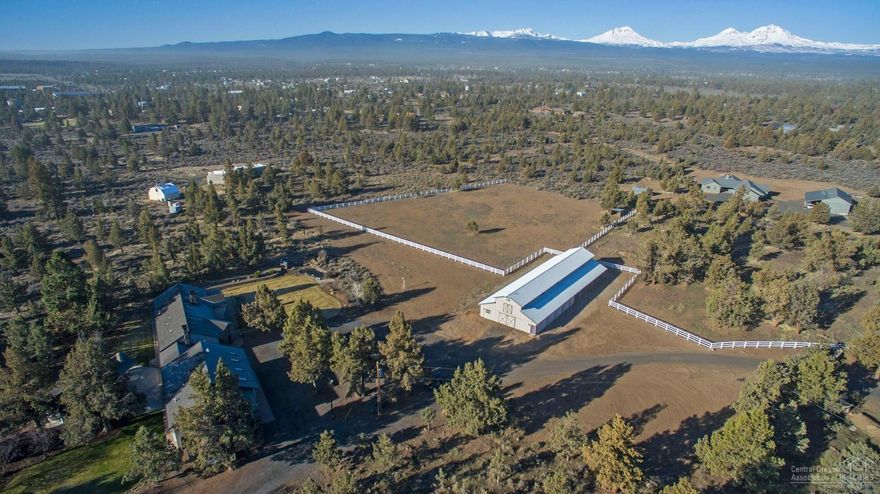 Exceptional Cascade Mountain views in a secluded landscaped setting! Top-notch horse property on 9.51 acres with gorgeous 7-Stall 2,640 SF barn, 2 fenced pastures & access to BLM. The beautiful single-level home has 3,708 total SF, including 3 bedrooms, 3 baths, family room or 2nd living area, kitchenette, 2 utility rooms & office, plus 2 upstairs hobby/bonus rooms accessed through the garage. Gourmet kitchen with island, walk-in pantry & outdoor pizza oven. Master on the main level has a fireplace, sauna, jetted tub, walk-in closet, 2 patios & outdoor hot tub. Barn includes wash stall, office/tack room & turnout area. 29X39-ft. 2-bay heated garage/shop has windows, 2 workbenches & storage cabinets. Additional single-bay garage with loft. Also: RV parking & hook-ups, workshop & a potting shed. Centrally located between Bend, Sisters & Redmond in the esteemed Sisters School District. 30 minutes to Redmond Airport. Enjoy world-class skiing & outdoor activities!