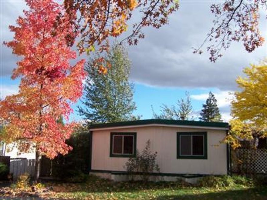 Cozy clean 3 bedroom, 1.5 bath doublewide in Ashland's Wingspread Park. New paint with lots of light, a fenced yard, carport with new roof, 2 sheds plus additional parking round out this older home in an all age park with duck pond. Shopping and restaurants nearby.