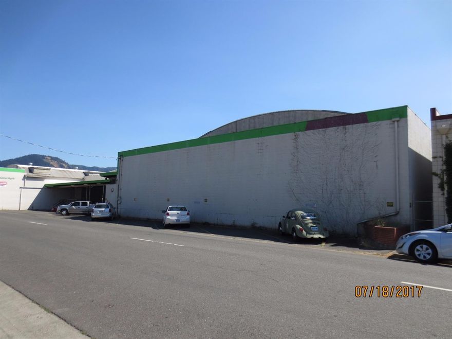 Huge Commercial Building in downtown Grants Pass. So many possibilities! Approx. 46,000 sf of warehouse space with some finished office space. Used for years as a distribution center. There's an approx. 1,500 sf cooler space. Multiple tax lots, parking on East side, loading bays, railroad frontage. Owners are interested for lease at 0.25 cents a square foot. 1.71 acres zoned GC and CBD. All information is deemed reliable but not verified; anyone considering purchasing this property should perform their own investigation into the uses and condition of the property.