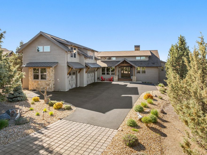 This impeccably maintained home is nestled on a quiet street in the desirable Brasada Ranch community. The main level features open-concept living with a beautifully designed kitchen, vaulted-ceiling great room, and a spacious primary suite with a custom river rock shower. Also on the main level you will find two additional ensuite bedrooms—perfect for welcoming guests. A custom pantry, office, and laundry room all add convenience and functionality. Upstairs, enjoy a generous bonus room complete with a kitchenette/bar, an extra bedroom and bath, and sweeping mountain views. The spacious, partially covered deck invites you to unwind and take in the picturesque mountain scenery, and the three-car garage offers plenty of storage for all of your Central Oregon toys.  Call or text listing agent for the gate code.