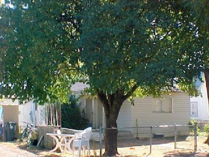 Three for the price of one! The front unit is a 2 bedroom, 1 bath home with attached garage, fenced yard and additional parking and is rented for $600.00 The back duplex is a bedroom, 1 bath on each side with storage shed off of front porch. Unit A has a nice front & side yard. These units share a large backyard. Both of these units are rented for a total of $725.