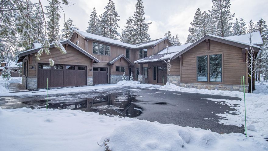 Nestled among majestic pine trees, enjoy the peacefulness of this beautiful home across from Sable Rock Park. This custom NW style home offers ample gathering spaces perfect for large groups, reunions, retreats, and special get-a-ways. There are three on-suites suites on the main level along with great room, gourmet kitchen, dining area, laundry/mudroom, powder bath and an expansive covered paver patio. Upstairs find two more suites plus recreation/bunk room. Features include distressed wood beams, custom cabinetry, rich woods, solid surfaces, designer tile, high-end appliances, and wi-fi enabled two zoned Central A/C. Contact your agent to preview today.