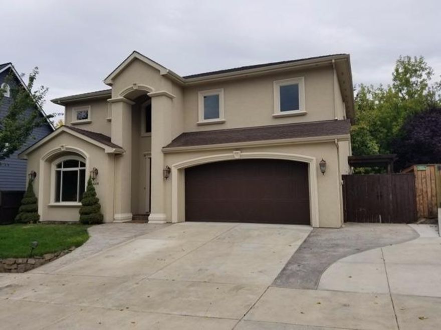 Stunning Stucco Custom Built Home. The Exterior Architecture and the Interior Floor Plan are are full of detail. When you enter the home you will fall in love with. Lots of natural light, travertine floors, and gorgeous wood floors. This Kitchen is Phenomenal with all Custom Cabinets, jenn air (Gas Range), Incredible Granite. Large island. Lots of storage. Living room, family room, dining room, coffered ceiling, inset lighting, breathtaking gas fireplace custom mantle. The Master Bedroom has his and hers walk in closets and a huge custom bathroom. The Master bath has a shower you will Love. Covered patio and upstairs has an additional covered patio. This home is 4 Bedrooms. Vacant and ready to move in. Lots of upgraded lighting. To much to mention