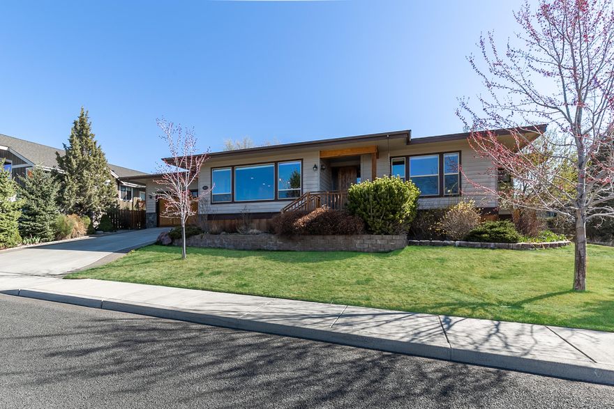 Stunning and spacious home with mountain views in the desirable Cascade View Estates neighborhood. 
Great SW Redmond location with views from the oversize picture windows are a pleasant highlight of this gorgeous home! 
This property features a beautiful travertine tile entry and kitchen flooring, granite countertops, tile backsplash, breakfast bar with pendant lighting, and stainless steel appliances, while the front living room includes a gas fireplace with built in shelves and glass-front cabinets.  This house has knotty alder doors throughout, ceilings fans throughout, lots of roomy, walk-in storage closets, and spotlights separately a walk-in pantry, an ample mudroom, and a full utility room for use with counterspace and sink. The private courtyard style backyard and patio includes raised planter beds in grass as well as concrete curb edging around perimeter of space. Surround sound is included. Lots of storage in the 3 car tandem garage for outdoor equipment or vehicle storage.