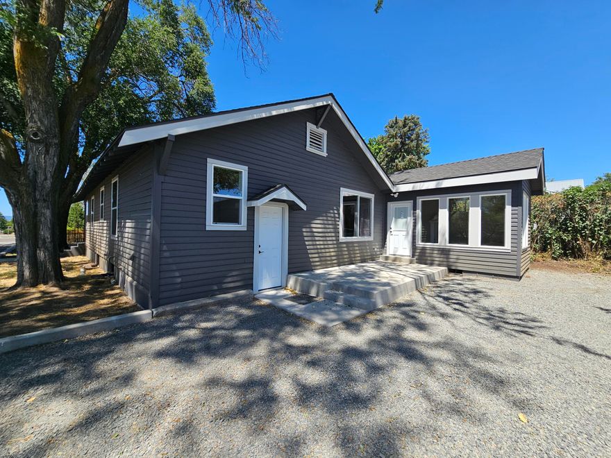 Charming 2,010 sq. ft. home with 3 bedrooms and 2 baths, situated on 0.48 acres. This home has been completely updated! It features LVP flooring throughout, all-new appliances and cabinetry in the kitchen, new vanities in the bathrooms, Corian countertops, a tiled shower, a shower/tub insert, a shiplap fireplace with an electric insert, new windows, insulation, a new furnace, and AC. Additionally, a brand-new well was drilled in 2024, a new composition roof has been installed, and both the interior and exterior have been freshly painted. LED lighting is featured throughout, along with new concrete work, a new wood fence, and ample space for RV or boat parking. Don't miss out on this beautifully renovated home. Listing agent is related to one of the sellers.