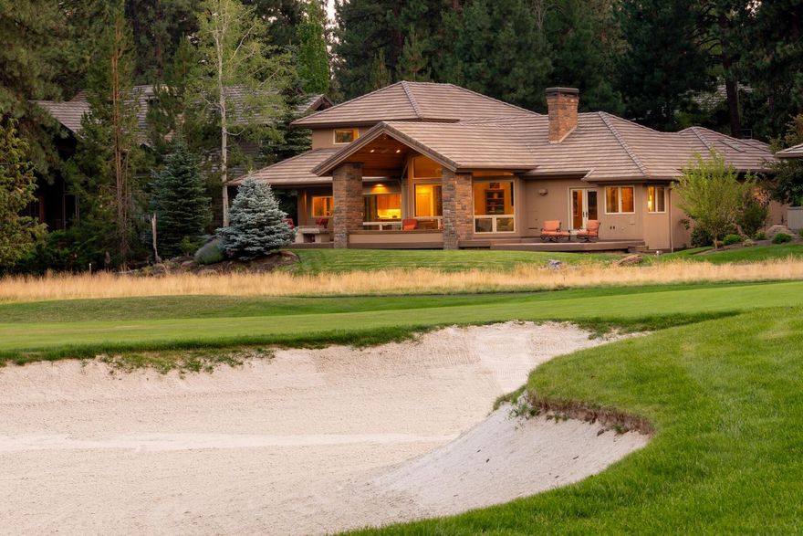 Discover this classic beauty in Broken Top,  built by Steve Madsen, renowned for his exceptional quality construction. The moment you step inside, the home's superior craftsmanship is unmistakable. Open great room floorplan, with a welcoming design and soaring vaulted ceilings, offers stunning views of the 10th fairway and green. Situated in the heart of Bend's most iconic neighborhood, this home occupies a premium lot. Close to the clubhouse, driving range, pickleball/tennis courts, and pool! This home boasts mostly single-level living, with the exception of a spacious 600sf bonus room upstairs. The luxurious primary bedroom features a fireplace, complemented by two ensuite guest suites, a large office, and a beautifully updated kitchen with SS designer appliances, a sizable island, and an eating bar. The oversized 3 car garage includes epoxy floors, extensive cabinetry, and a workshop area. Experience this serene and peaceful setting from the large east facing, paver patio!