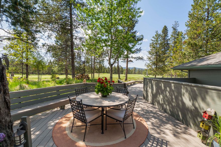 Fantastic location! This beautiful home in Sunriver is perfectly situated on the 15th fairway of the Woodlands Golf Course.   Home features an updated gourmet kitchen w/ quartz countertops, a farmhouse-style sink & stainless appliances. The great room has vaulted ceilings & a stone gas fireplace, while the family room showcases vaulted wood ceilings, open trusses & an additional stone/gas fireplace & bar w/ built in cabinets. Wood flooring runs throughout the home, complemented by stunning woodwork that enhances the warm, Sunriver feel. Open floorplan on the main level includes the kitchen, great room, dining area & family room. Also on the main level you will find 2 bedrooms, 2 full bathrooms, laundry room & sauna. Upstairs is the primary suite, an additional bedroom and an office/flex space. Updated pantry/mudroom leads to a 2-car garage. Expansive outdoor living area w/ hot tub & views of the fairway.